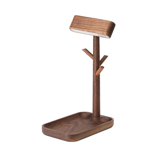 Wooden lamp with multiple arms and a tray on a white background