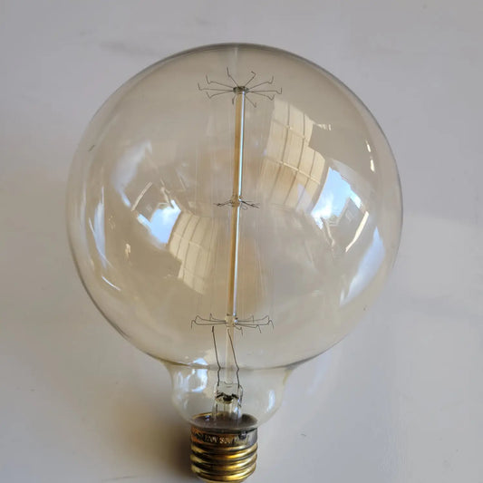 Clear light bulb on a white background