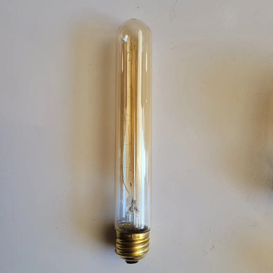 Vintage-style light bulb on a white background